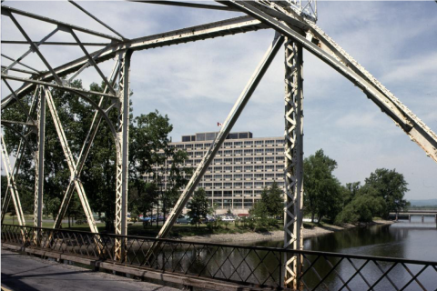 Diefenbaker Building 58 - exterior view of 1958 building from south east through Minto Bridge
