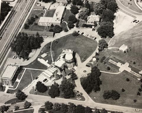A black and white photograph of the Dominion Observatory from an aerial view.